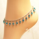 Chaine de cheville pi&egrave;ces m&eacute;tal et toupies turquoise